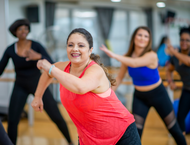 Five Women in activity wear dance-exercising with oodles of noodles